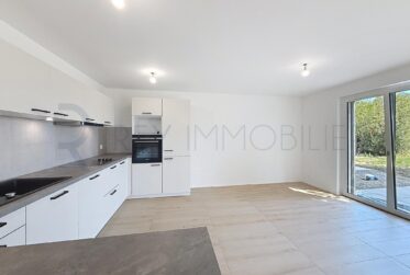 Triplex neuf dans villa avec terrasse et jardin